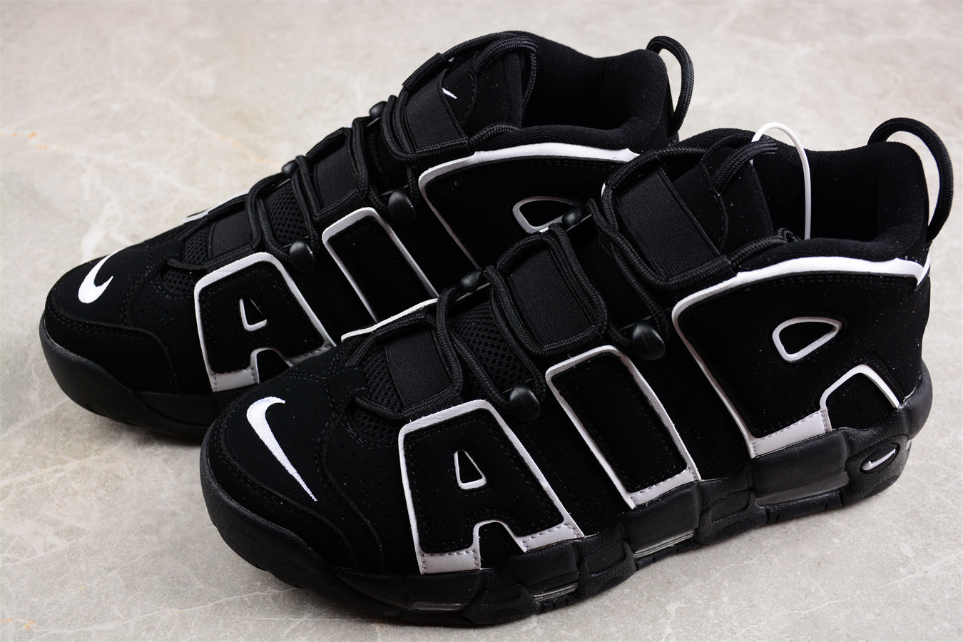 Nike Air More Uptempo Black close up both
