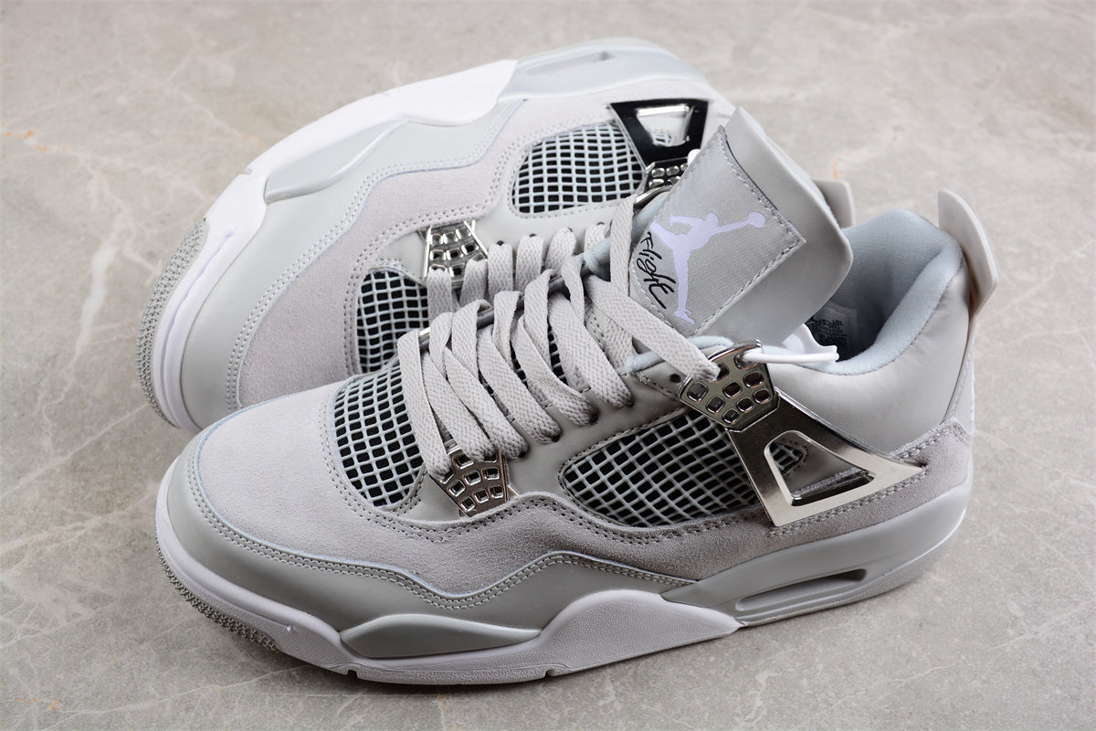 Pair of white sneakers with a textured design on a light gray background