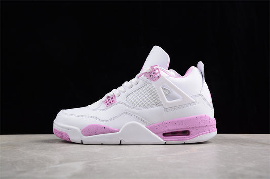 White and pink sneaker on a black background
