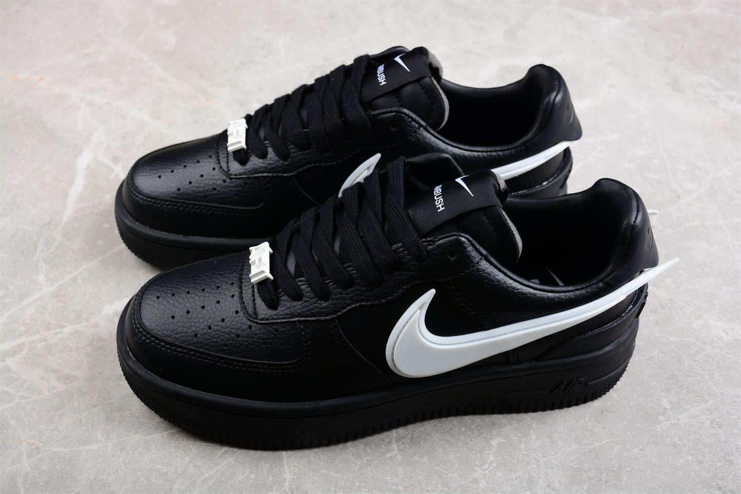 AMBUSH x Nike Air Force 1 Low 'Black' close up both