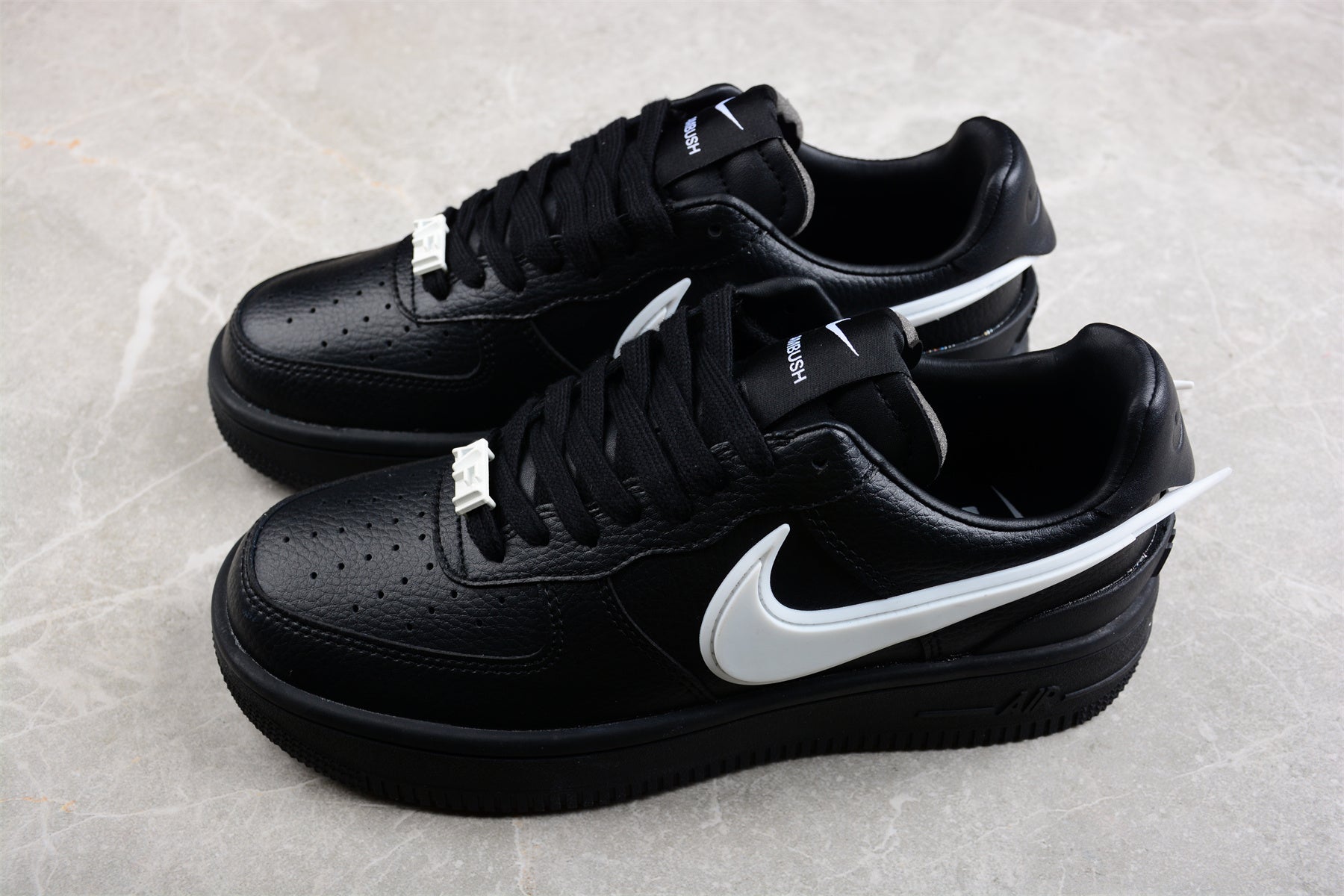 AMBUSH x Nike Air Force 1 Low 'Black' close up both