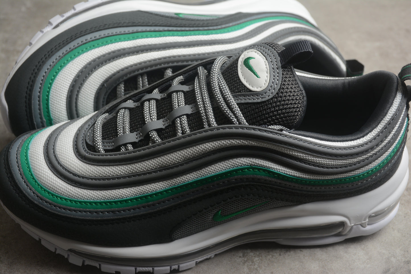 Nike Air Max 97 Stadium Green close up both