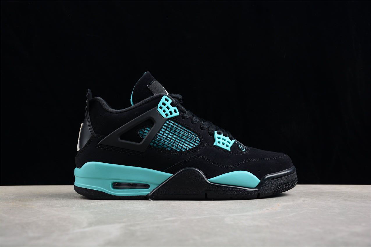 Black and teal sneaker on a dark background
