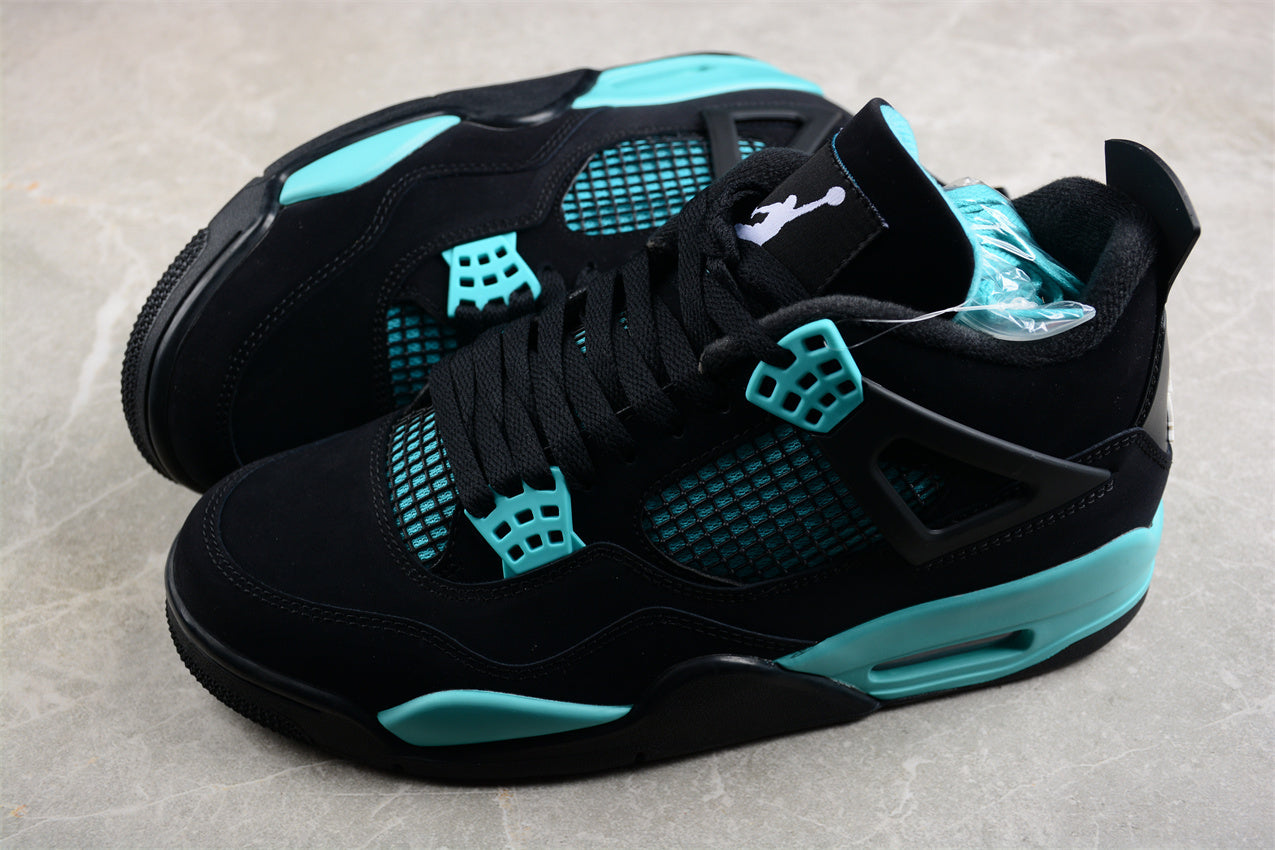 Black and teal sneakers on a light gray background